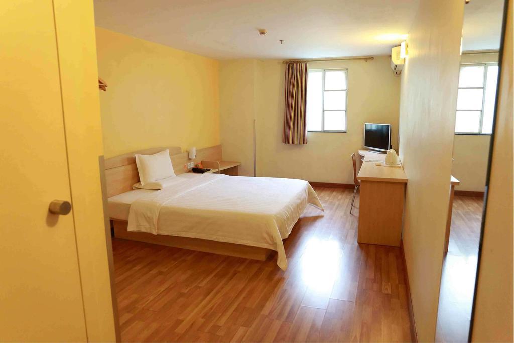 7Days Inn Taizhou Nantong Road Zhongjia Номер фото