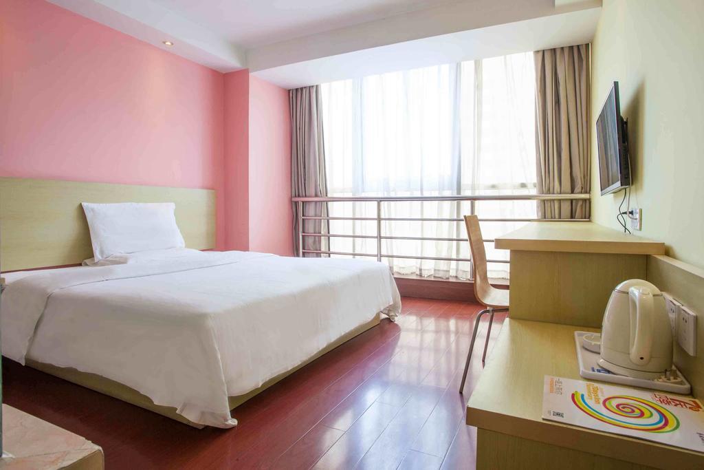 7Days Inn Taizhou Nantong Road Zhongjia Номер фото
